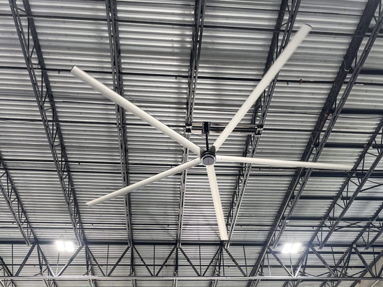 Large industrial ceiling fan in warehouse