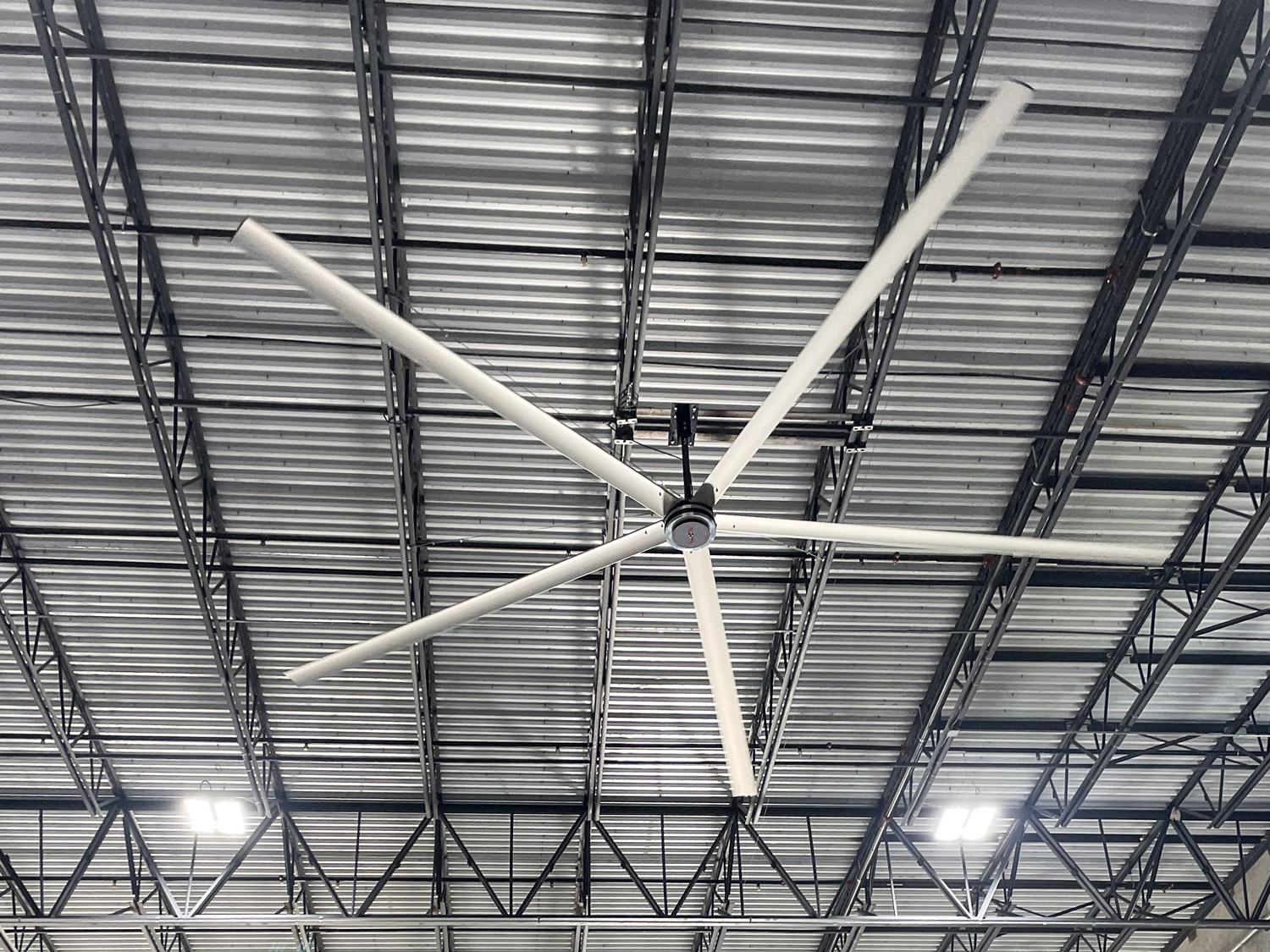 Large industrial ceiling fan in warehouse